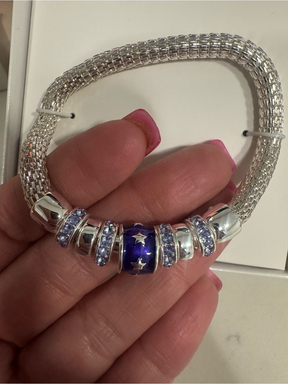 Nine West Silver Mesh Bracelet with Purple Star Charm and Light Blue Accents